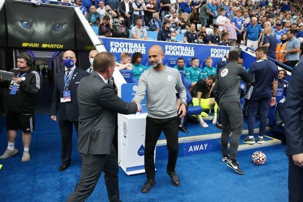 Leicester City Manager Brendan Rodgers welcomes Manchester City Manager Pep Guardiola to King Power Stadium ahead of the Premier League match between...