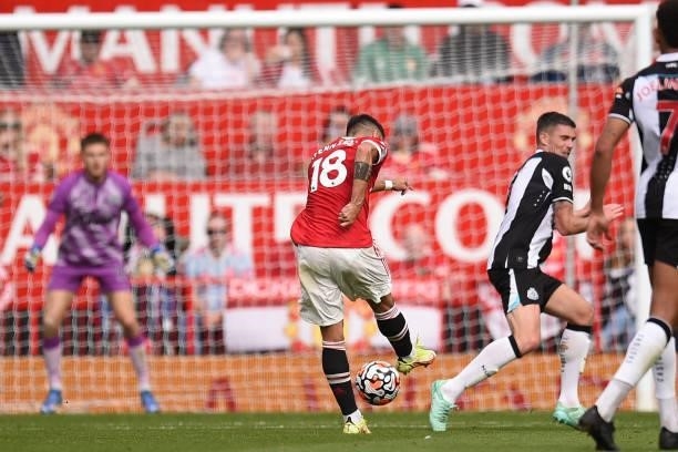 Manchester United's Portuguese midfielder Bruno Fernandes has an unsuccessful shot during the English Premier League football match between...