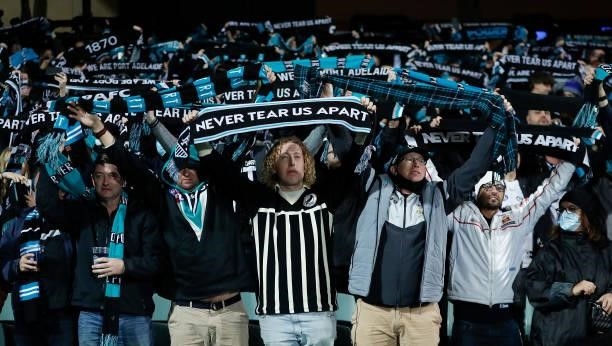 Port fans are seen during the 2021 AFL Second Preliminary Final match between the Port Adelaide Power and the Western Bulldogs at Adelaide Oval on...