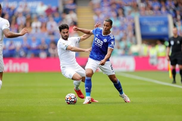 Youri Tielemans of Leicester City in action with lkay Gündoan of Manchester City during the Premier League match between Leicester City and...