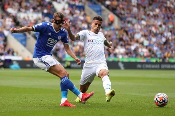 Timothy Castagne of Leicester City and Joao Cancelo of Manchester City during the Premier League match between Leicester City and Manchester City at...