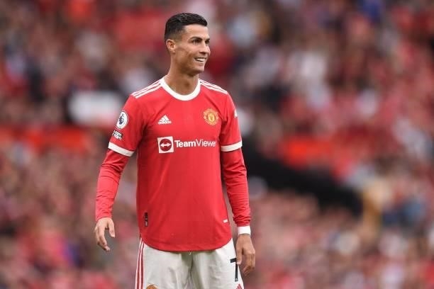 Manchester United's Portuguese striker Cristiano Ronaldo smiles during the English Premier League football match between Manchester United and...