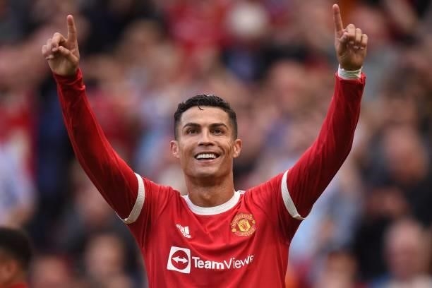 Manchester United's Portuguese striker Cristiano Ronaldo celebrates after scoring their second goal during the English Premier League football match...