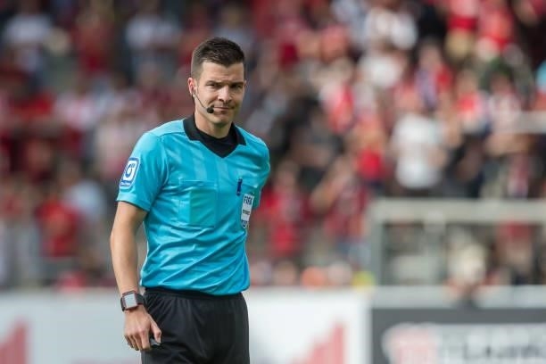 Referee Harm Osmers Looks on during the Bundesliga match between Sport-Club Freiburg and 1. FC Koeln at Dreisamstadion on September 11, 2021 in...