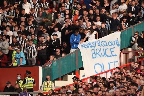 Newcastle fans display a banner against the owners and manager during the English Premier League football match between Manchester United and...