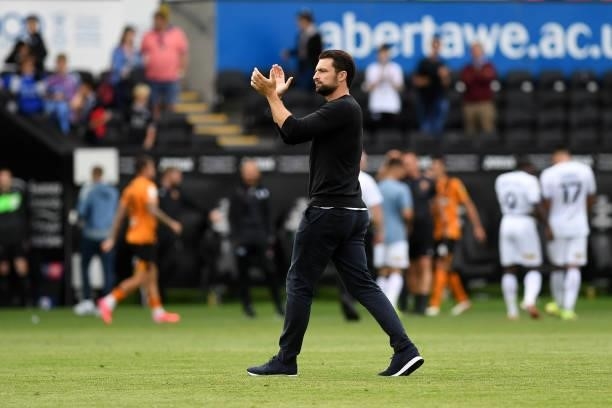 Russell Martin Head Coach of Swansea City applauds the fans at the final whistle during the Sky Bet Championship match between Swansea City and Hull...