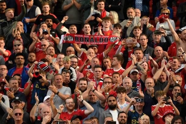 Supporter holds up a Ronadlo scarf during the English Premier League football match between Manchester United and Newcastle at Old Trafford in...