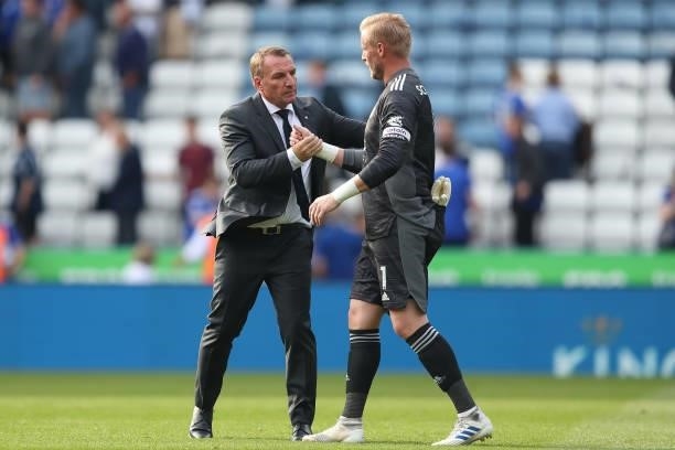 Brendan Rodgers the manager / head coach of Leicester City and Kasper Schmeichel of Leicester City during the Premier League match between Leicester...