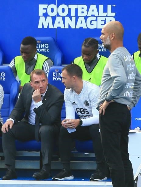 Leicester City's Northern Irish manager Brendan Rodgers and Manchester City's Spanish manager Pep Guardiola watch during the English Premier League...