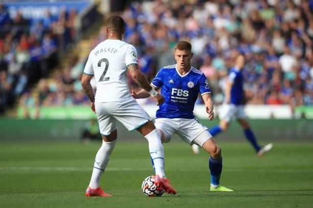 Kyle Walker of Manchester City battles with Harvey Barnes of Leicester City during the Premier League match between Leicester City and Manchester...