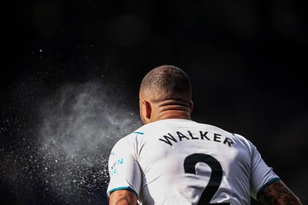 Kyle Walker of Manchester City spits water during the Premier League match between Leicester City and Manchester City at The King Power Stadium on...