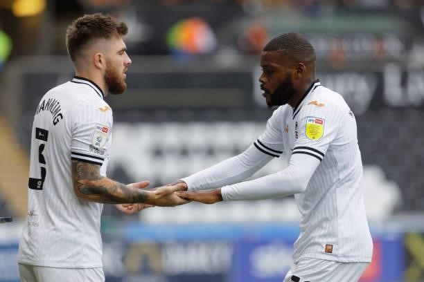 Ryan Manning of Swansea City substitutes Olivier Ntcham during the Sky Bet Championship match between Swansea City and Hull City at the Swansea.com...