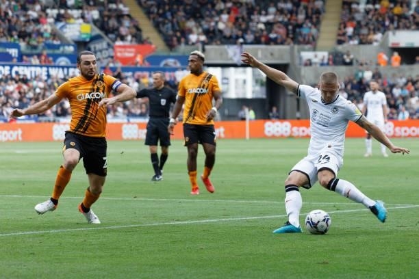 Jake Bidwell of Swansea City takes a cross during the Sky Bet Championship match between Swansea City and Hull City at the Swansea.com Stadium on...