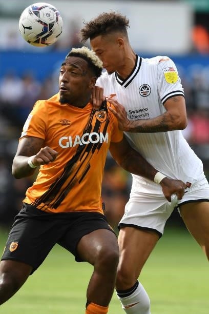 Mallik Wilks of Hull City under pressure from Rhys Williams of Swansea City during the Sky Bet Championship match between Swansea City and Hull City...