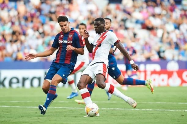 Rober Pier of UD Levante and Randy Nteka of Rayo Vallecano battle for the ball during the LaLiga Santander match between Levante UD and Rayo...