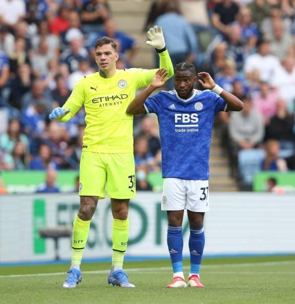 Manchester City's Ederson Santana de Moraes and Leicester City's Ademola Lookman during the Premier League match between Leicester City and...