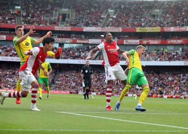 Kenny McLean of Norwich City, Takehiro Tomiyasu of Arsenal, Gabriel of Arsenal and Brandon Williams of Norwich City during the Premier League match...