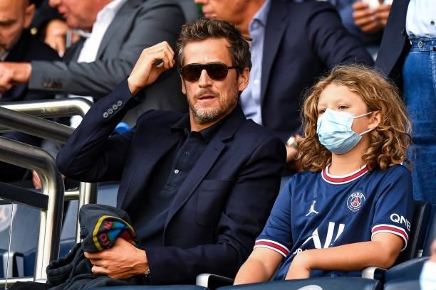 French actor Guillaume CANET with his son Marcel CANET during the French Ligue 1 Uber Eats soccer match between Paris Saint Germain and Clermont at...