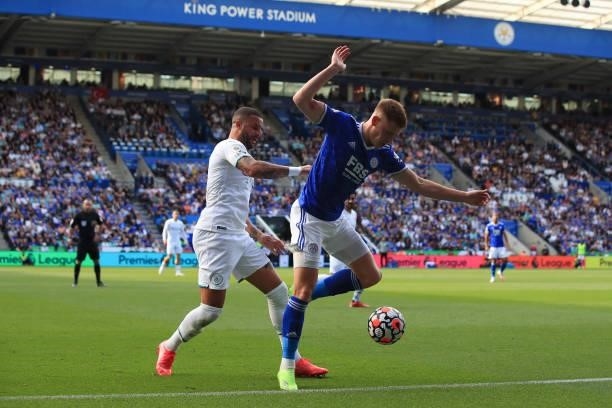 Kyle Walker of Manchester City in action with Harvey Barnes of Leicester City during the Premier League match between Leicester City and Manchester...