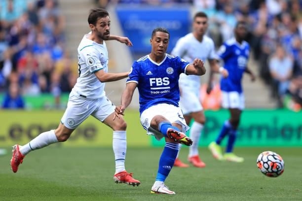 Youri Tielemans of Leicester City in action with Bernardo Silva of Manchester City during the Premier League match between Leicester City and...