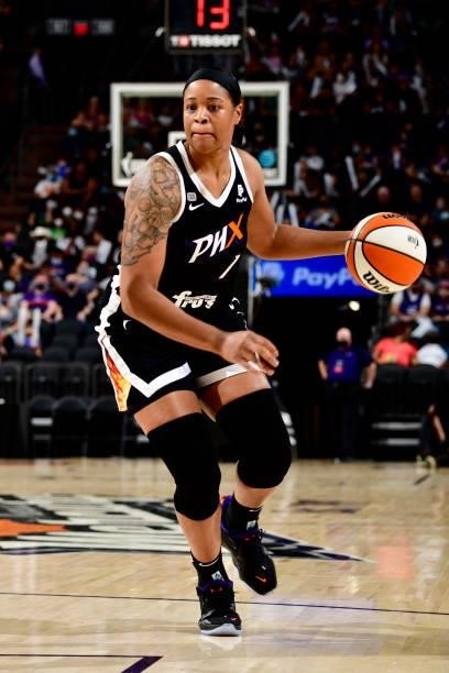 Kia Vaughn of the Phoenix Mercury dribbles the ball during the game against the Connecticut Sun on September 11, 2021 at Footprint Center in Phoenix,...