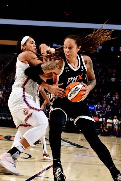 Brittney Griner of the Phoenix Mercury handles the ball during the game against the Connecticut Sun on September 11, 2021 at Footprint Center in...