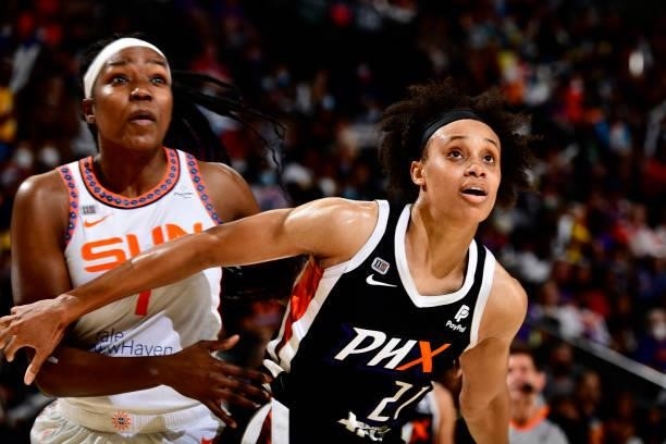 Beatrice Mompremier of the Connecticut Sun and Brianna Turner of the Phoenix Mercury fight for position during the game on September 11, 2021 at...