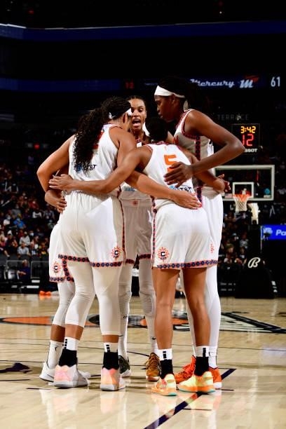 Connecticut Sun players huddle up during the game against the Phoenix Mercury on September 11, 2021 at Footprint Center in Phoenix, Arizona. NOTE TO...
