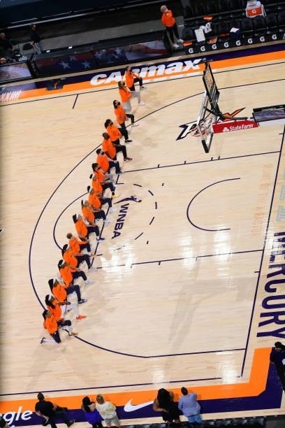The Connecticut Sun kneel before the game against the Phoenix Mercury on September 11, 2021 at Footprint Center in Phoenix, Arizona. NOTE TO USER:...