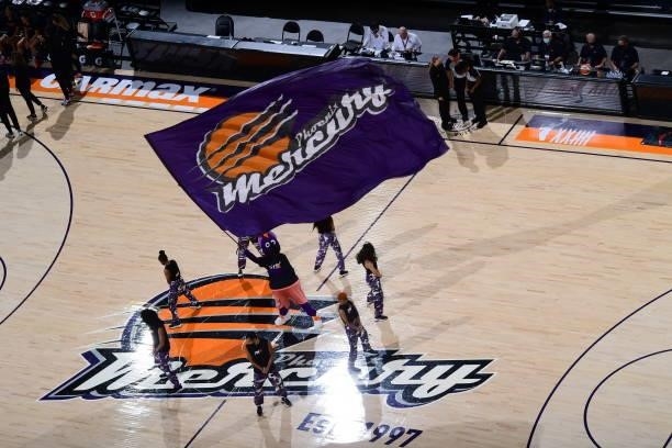 The mascot waves the Phoenix Mercury flag before the game against the Connecticut Sun on September 11, 2021 at Footprint Center in Phoenix, Arizona....