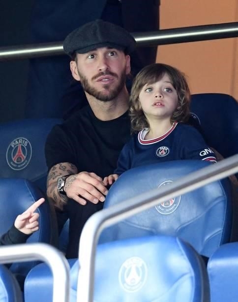 Paris Saint-Germain's Spanish defender Sergio Ramos attends with his son during the French L1 football match between Paris-Saint Germain and Clermont...