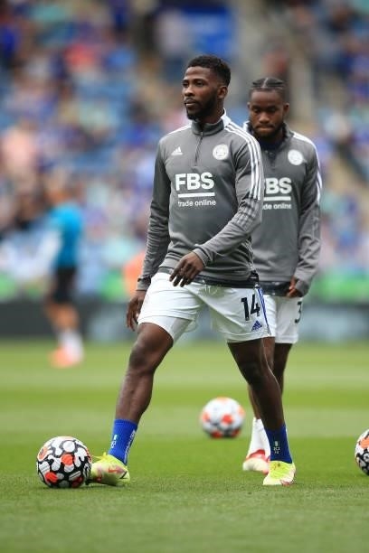 Kelechi Iheanacho of Leicester City and Ademola Lookman of Leicester City warm up before the Premier League match between Leicester City and...
