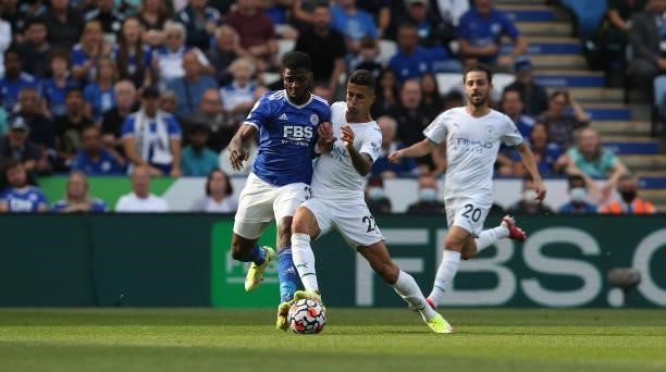 Leicester City's Kelechi Iheanacho battles with Manchester City's Joao Cancelo during the Premier League match between Leicester City and Manchester...