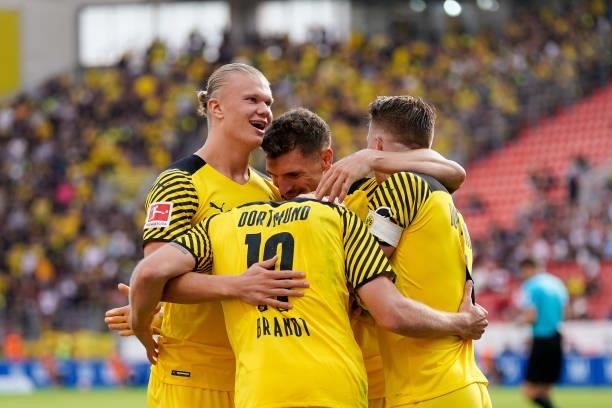 September 11: Julian Brandt of Borussia Dortmund celebrates after scoring his team's second goal with teammates during the Bundesliga match between...