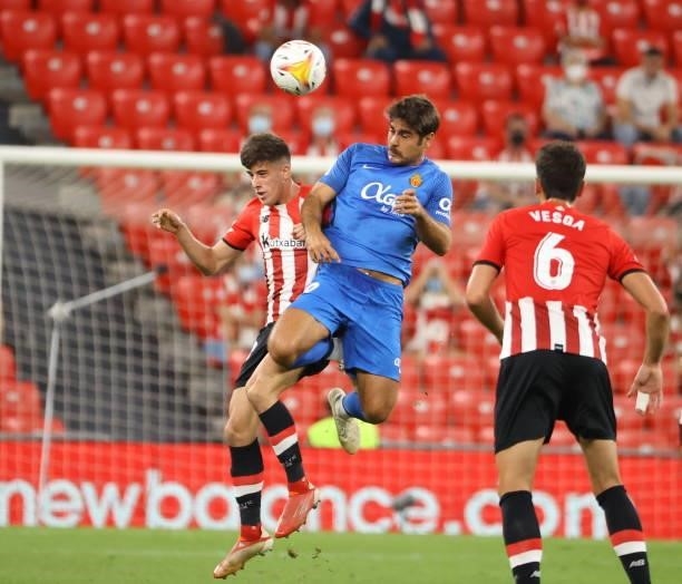 Abdom of RCD Mallorca and Serrano of Athletic Bilbao battle for the ball during the LaLiga Santander match between Athletic Club and RCD Mallorca at...