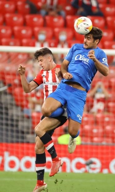 Abdom of RCD Mallorca and Serrano of Athletic Bilbao battle for the ball during the LaLiga Santander match between Athletic Club and RCD Mallorca at...