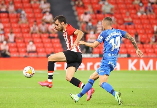 Inigo Lekue of Athletic Bilbao and Dani Rodriguez of RCD Mallorca battle for the ball during the LaLiga Santander match between Athletic Club and RCD...