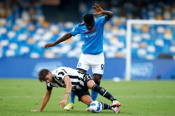 Manuel Locatelli of Juventus and Andre Anguissa of SSC Napoli battle for the ball during the Serie A match between SSC Napoli and Juventus FC at...