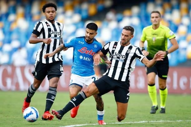 Lorenzo Insigne of SSC Napoli and Mattia De Sciglio of Juventus battle for the ball during the Serie A match between SSC Napoli and Juventus FC at...