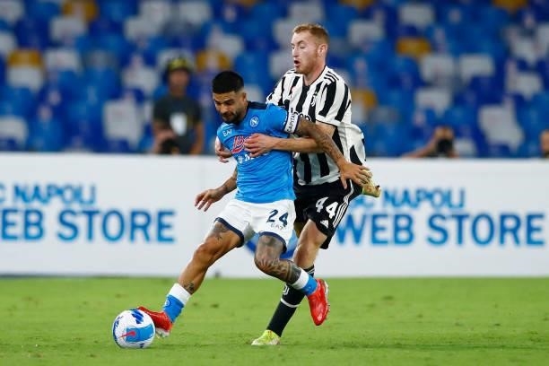 Lorenzo Insigne of SSC Napoli and Dejan Kulusevski of Juventus battle for the ball during the Serie A match between SSC Napoli and Juventus FC at...