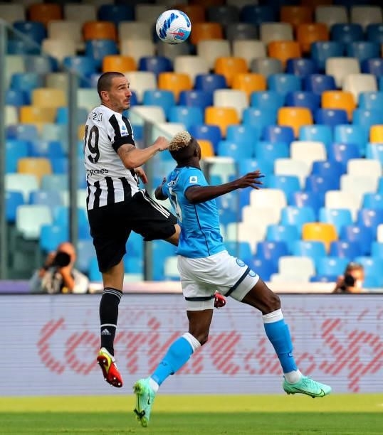 Leonardo Bonucci of Juventus competes for the ball with Victor Osimhen of Napoli during the Serie A match between SSC Napoli and Juventus at Stadio...