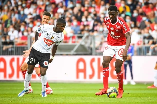 Mohamed-Ali CHO of Angers and Hianga'a MANANGA MBOCK of Brest during the Ligue 1 Uber Eats match between Brest and Angers at Stade Francis Le Ble on...
