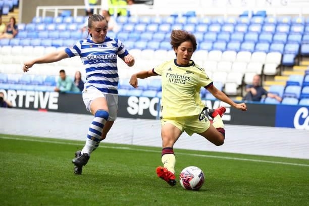 Mana Iwabuchi of Arsenal in action with Lily Woodham of Reading during the Barclays FA Women's Super League match between Reading Women and Arsenal...