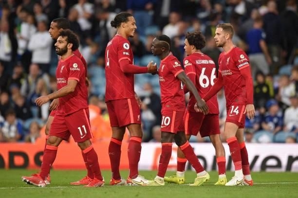 Liverpool's Senegalese striker Sadio Mane celebrates scoring his team's third goal during the English Premier League football match between Leeds...