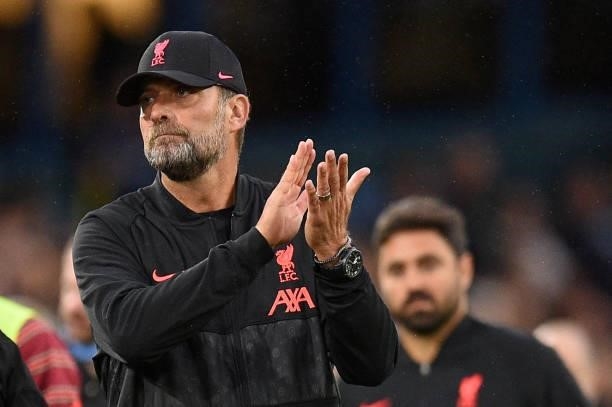 Liverpool's German manager Jurgen Klopp applauds the supporters at the end of the match during the English Premier League football match between...