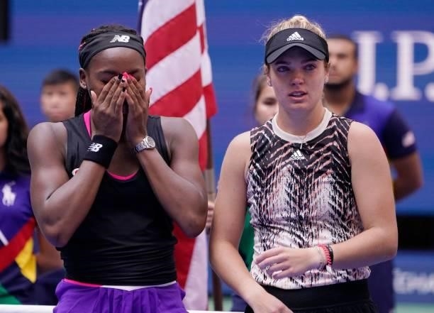 Player Coco Gauff and US player Catherine McNally await the trophy presentation after losing the 2021 US Open Tennis tournament women's doubles final...
