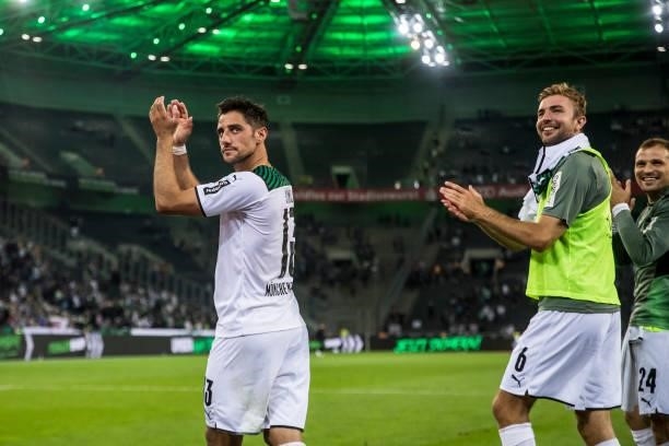Christoph Kramer and Lars Stindl of Borussia Moenchengladbach celebrate after the Bundesliga match between Borussia Moenchengladbach and Arminia...