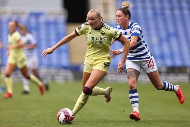 Frida Maanum of Arsenal in action with Rachel Rowe of Reading during the Barclays FA Women's Super League match between Reading Women and Arsenal...
