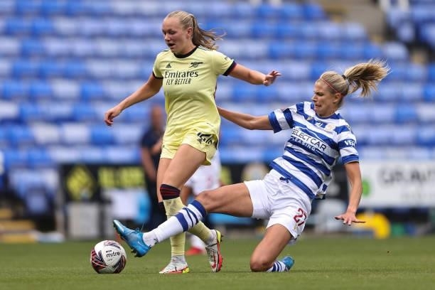 Frida Maanum of Arsenal in action with Justine Vanhaevermaet of Reading during the Barclays FA Women's Super League match between Reading Women and...