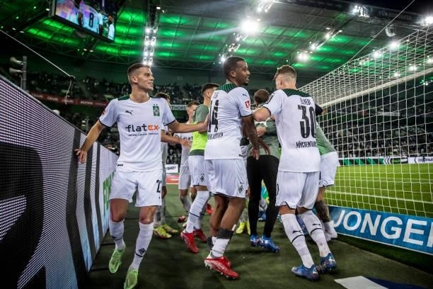 The Team of Borussia Moenchengladbach celebrate after the Bundesliga match between Borussia Moenchengladbach and Arminia Bielefeld at Borussia-Park...